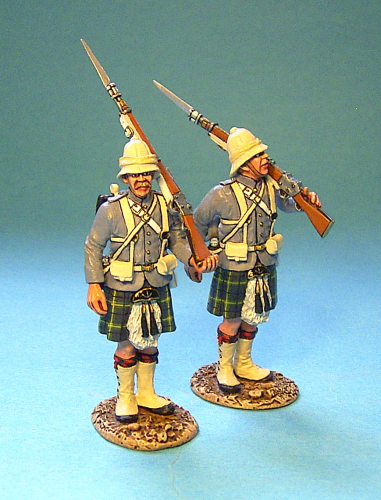 2 Highlanders Standing